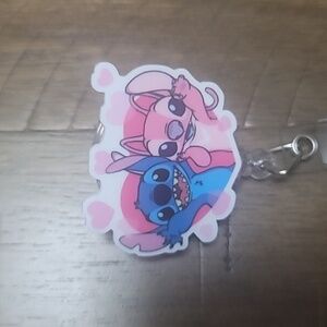 Stitch/Angel hearts badge reel
